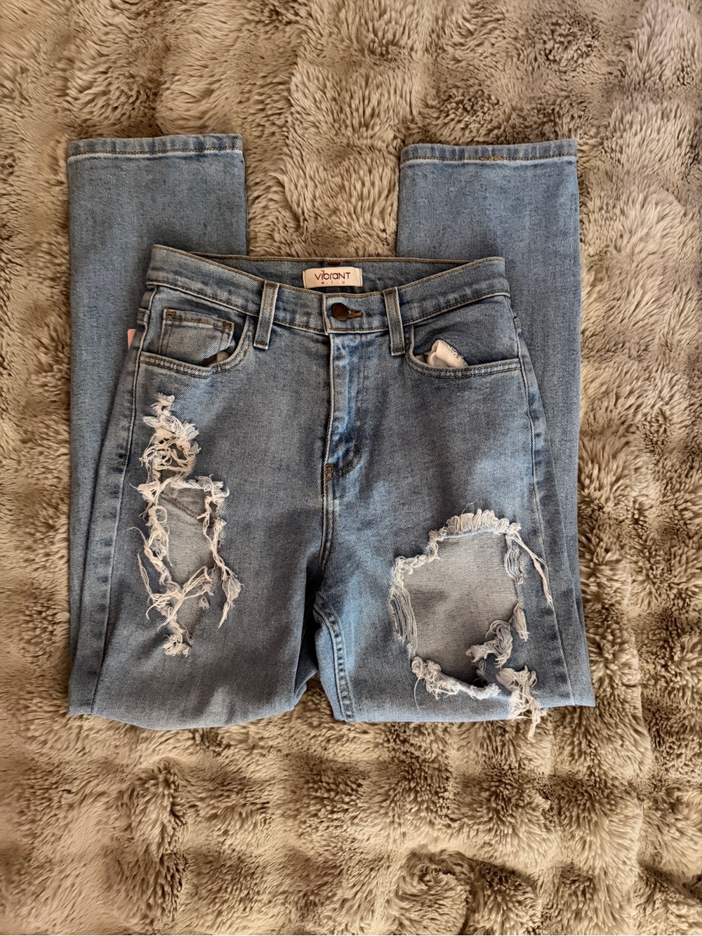 Vibrant Women's Light Wash High-Rise Distressed Jeans